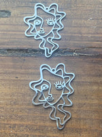 M0590  Set of TWO (2) Silver Plated Pendants “Artsy Face”