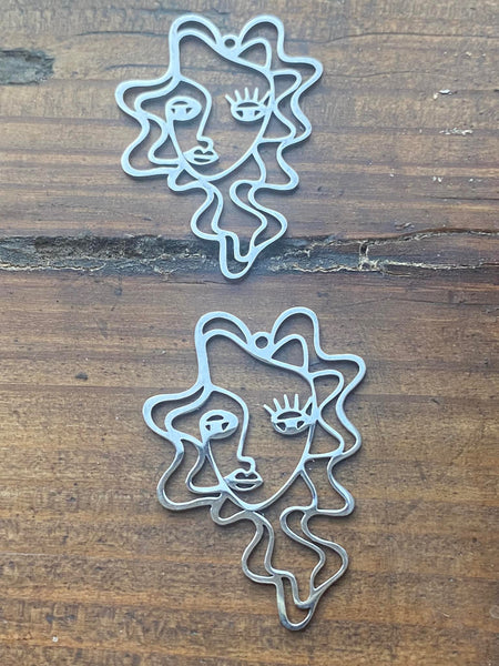 M0590  Set of TWO (2) Silver Plated Pendants “Artsy Face”