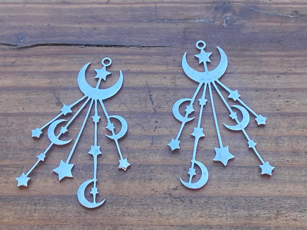 M1114  Set of TWO (2) Silver Plated Moon/Star Burst Pendants