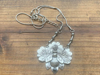 J5559  ONE (1) Silver Plated Metal Necklace with a Bee/Flower Pendant