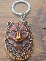 N1410  ONE (1) Imitation Bone Carved Keychain “Wolf Head”