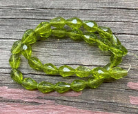 B3983   FULL Strand of Faceted Green Glass Beads