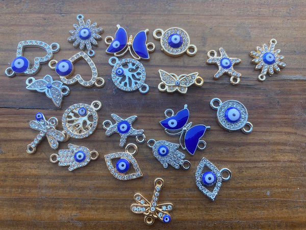 M0500  Set of TWENTY (20) Mixed Metal Rhinestoned Charms “Evil Eye”