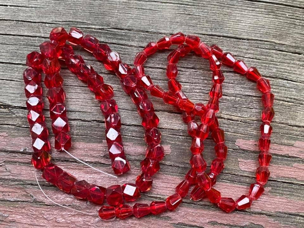 B3964  TWO (2) FULL Strands of Glass Beads “Red”