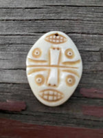 P1413  ONE (1) Carved Bone Pendant “Faces”