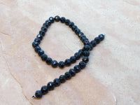 B2213  FULL Strand of Black Faceted Beads “AB Finish”