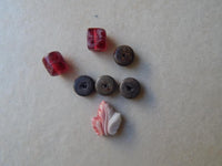 B2464   SEVEN (7) Various Sized Glass Beads “Burgundy”