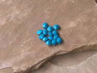 B2884   FOURTEEN (14) Saucer Glass Beads “Blue”