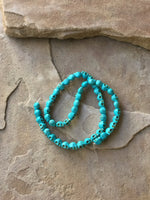 B2905  FULL Strand of Skull Howelite Beads “Turquoise”