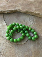 B2911  FULL Strand of Faceted Glass Beads “Green”