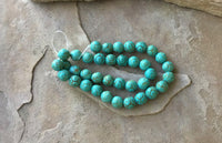 B2941   FULL Strand of Carved Turquoise Howelite Beads