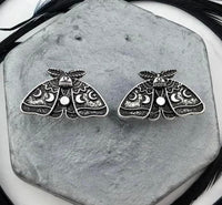 J0602  Pair of Steel Plated Post Earrings “Moon Phase/Moth”