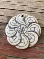 P1835  Highfired Double Sided Clay Pendant “Symbols”