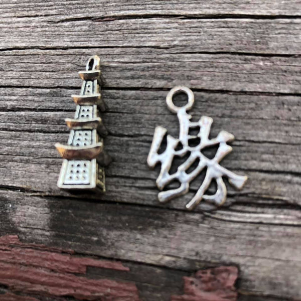 P0791   TWO (2) Silver Plated Metal Charms/Pendants “China”