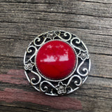 P0873  Red Howelite Cab set in a Silver Flowered Pendants/Connector