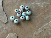 V0971  ELEVEN (11) Vintage Handmade Ceramic Trade Beads Circa 60’s